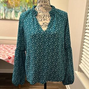 Small size floral blouse gently used